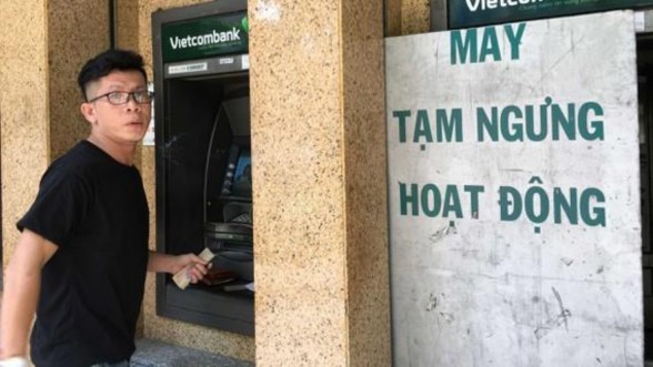 Ảnh phụ lục 7 12 Một máy ATM ngưng hoạt động ngày 31 1 Ảnh THÀNH TRÍ Mặc 1
