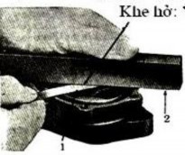 Kiểm tra khe hở giữa mặt ngoài hai đỉnh răng của bơm rô to Tiêu chuẩn 0 08 ÷ 0 2