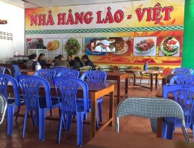 Hình 1 Công ty thương mại của người Việt tại Luang Prabang Hình 2 Quán ăn bình 2