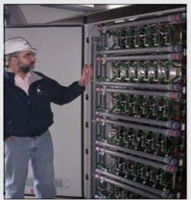 The photo at top left shows the power cable terminations which are behind a locked panel The power 1